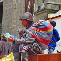 Man in front of the main church of Cotacachi